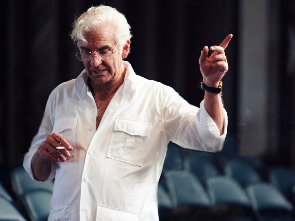 This image released by Netflix shows actor-director Bradley Cooper as Leonard Bernstein in a scene from "Maestro." (Jason McDonald/Netflix via AP)