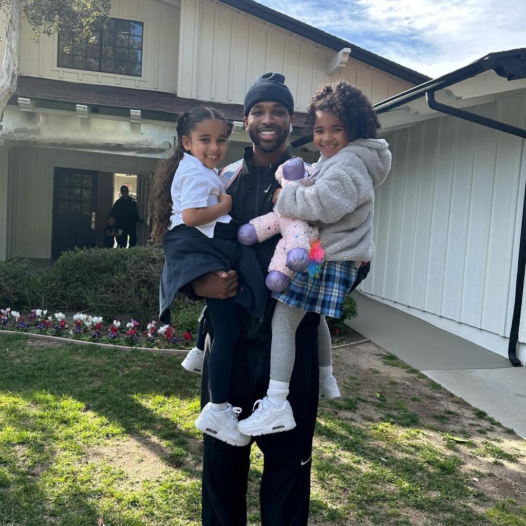 Tristan Thompson with his daughter True and Dream Kardashian