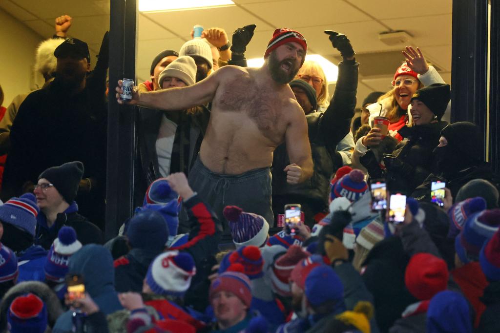 shirtless jason kelce revving up the football crowd
