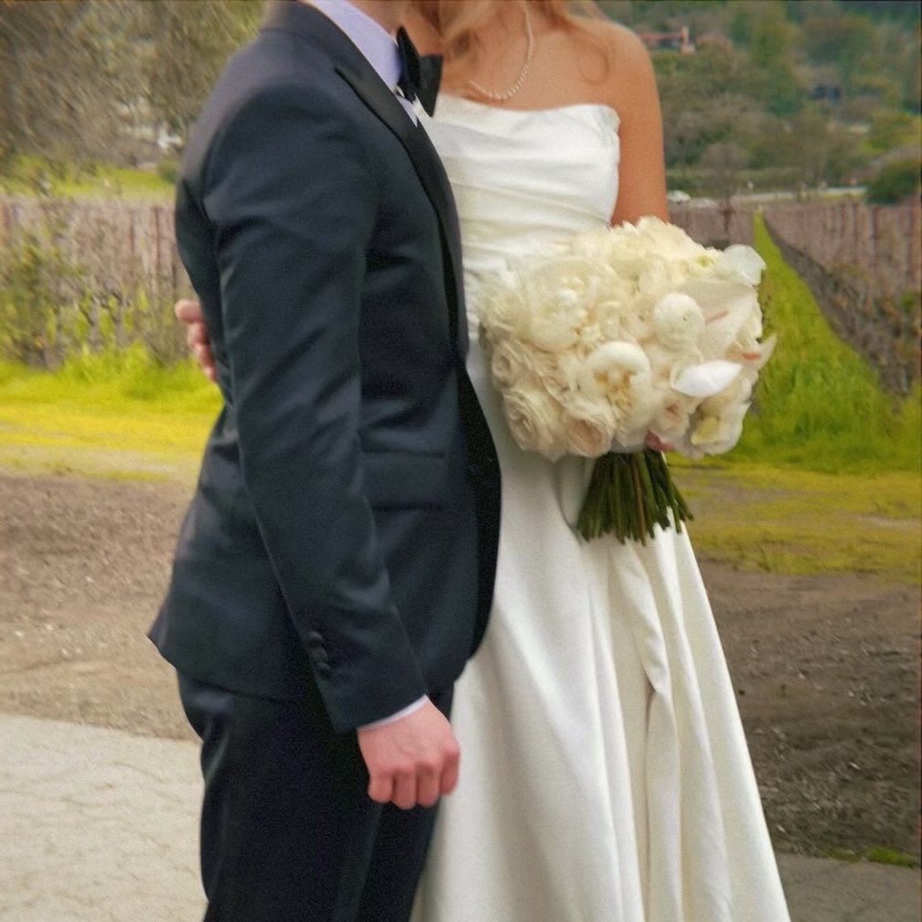 Lev Bure with his wife Elliott at their wedding