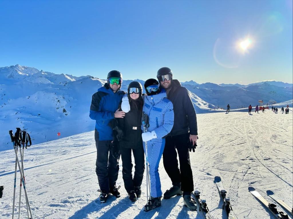 Sophie Turner and Peregrine Pearson posing for a photo with two of their friends