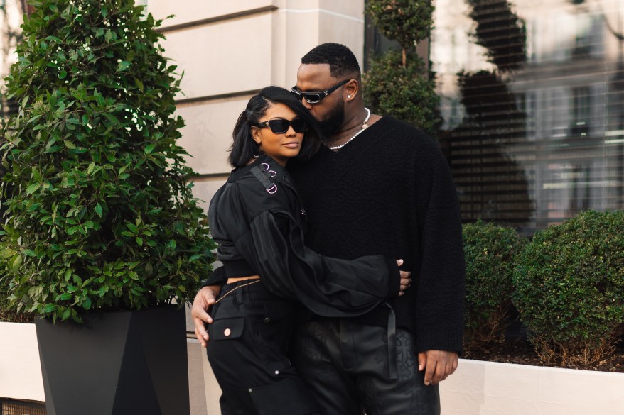 Chanel Iman and her fiancé, Davon Godchaux, kissing