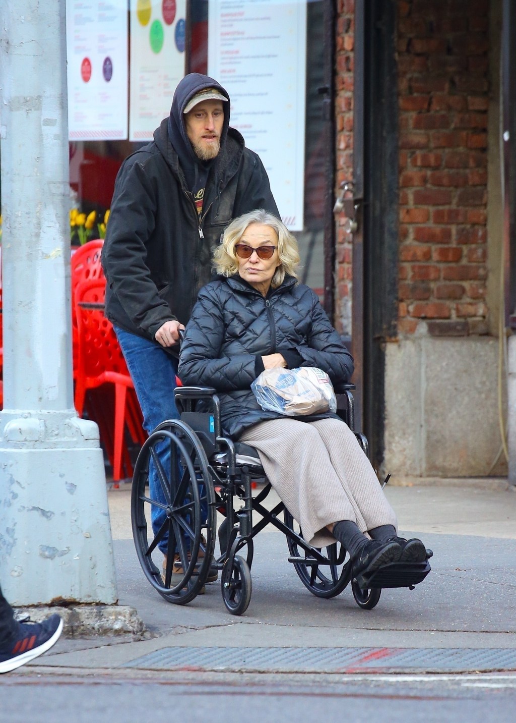 jessica lange's son pushing her in a wheelchair