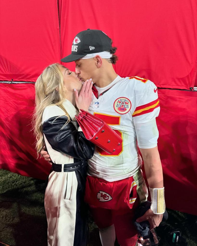 Brittany Mahomes kissing Patrick Mahomes.