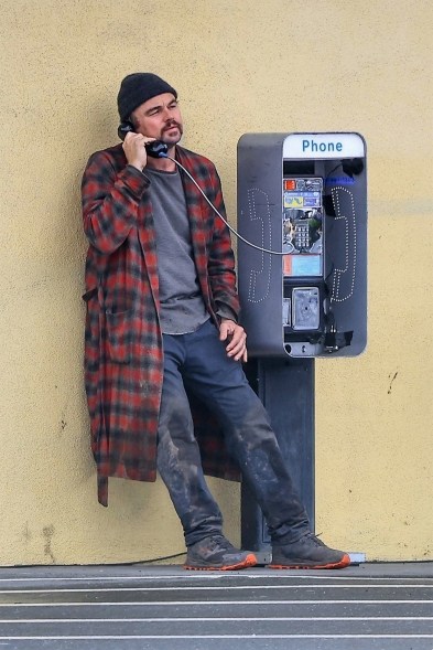 HOLD THE PHONE!: Leonardo DiCaprio goes old-school on the set of Paul Thomas Anderson’s film currently referred to as “BC Project.”