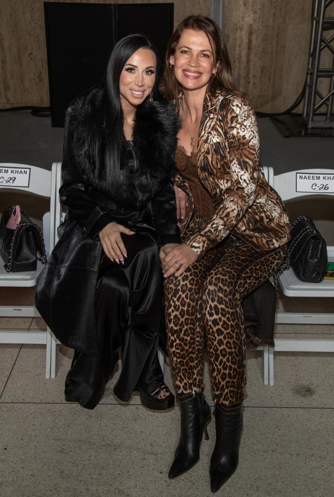 Real Housewives” stars Rachel Fuda — of “New Jersey” — and Julia Lemigova — of “Miami” — take a front-row seat together at the Naeem Khan show during New York Fashion Week.