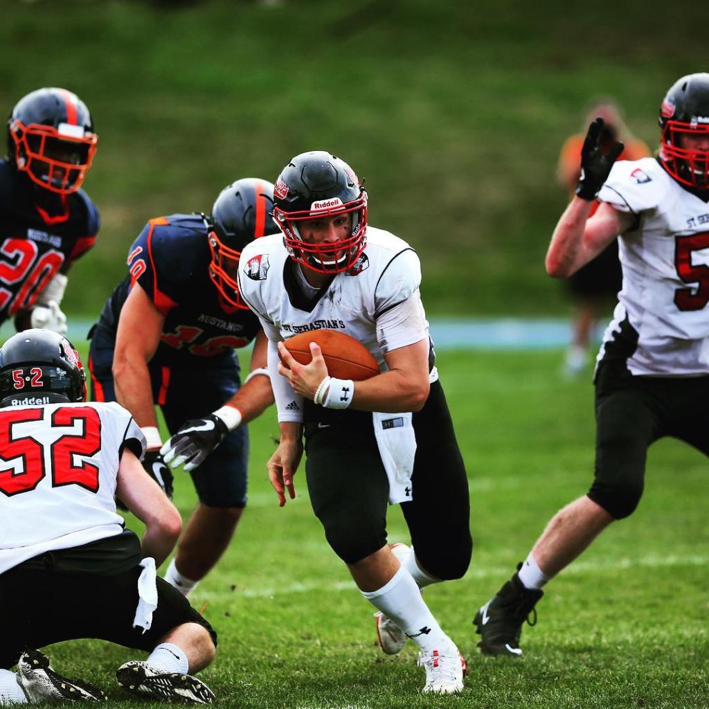 Billy Seidl playing football