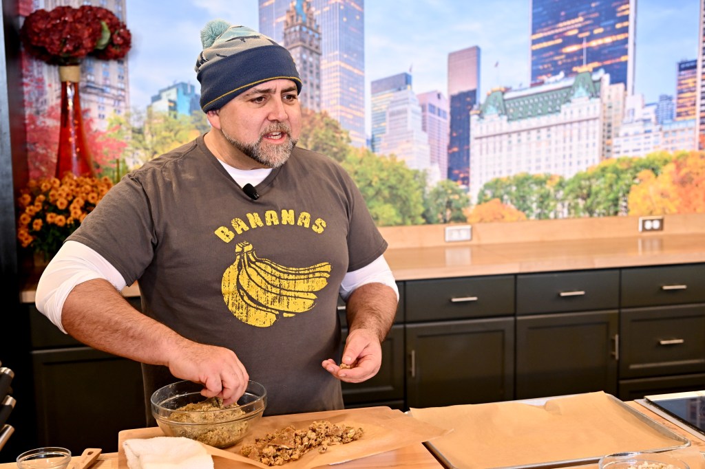 duff goldman working dough in a bowl