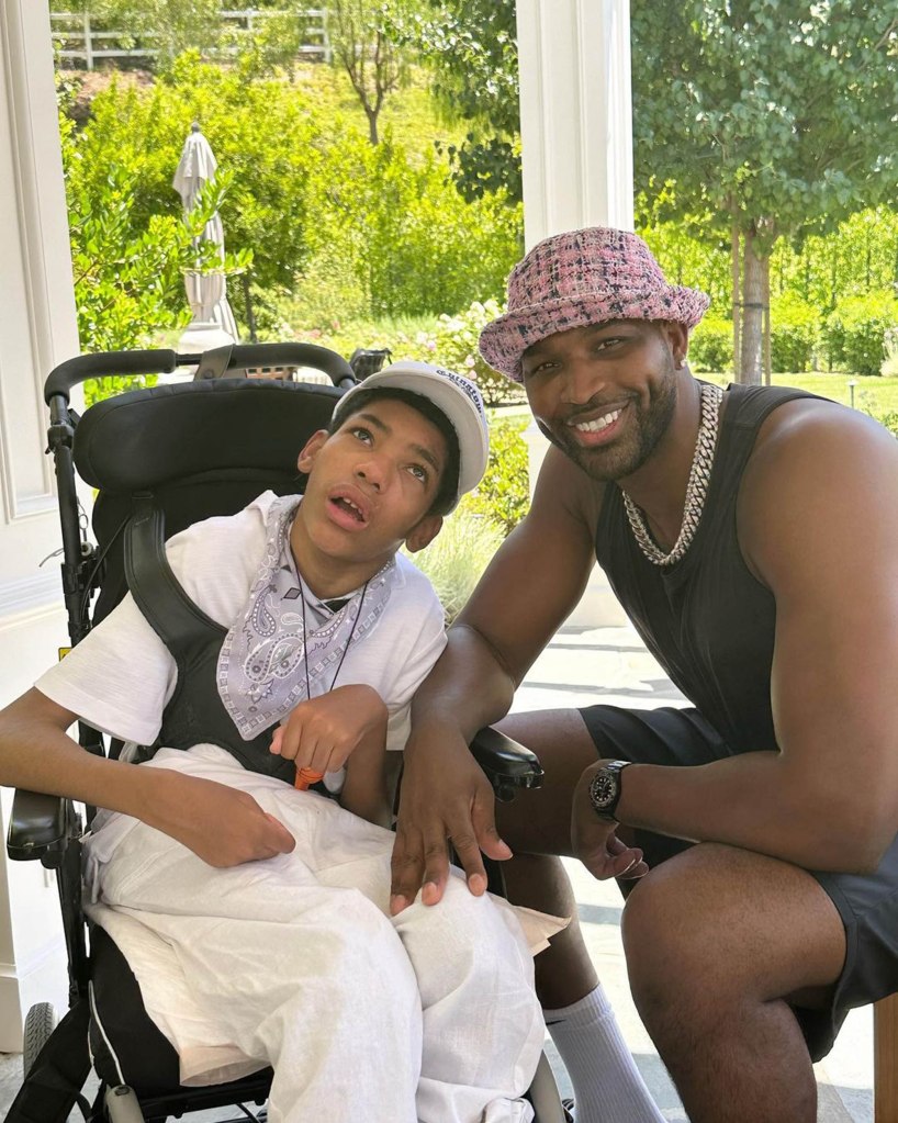 tristan thompson sitting next to his wheelchair-bound brother amari