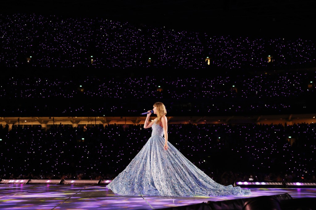 taylor swift singing in a huge ballgown