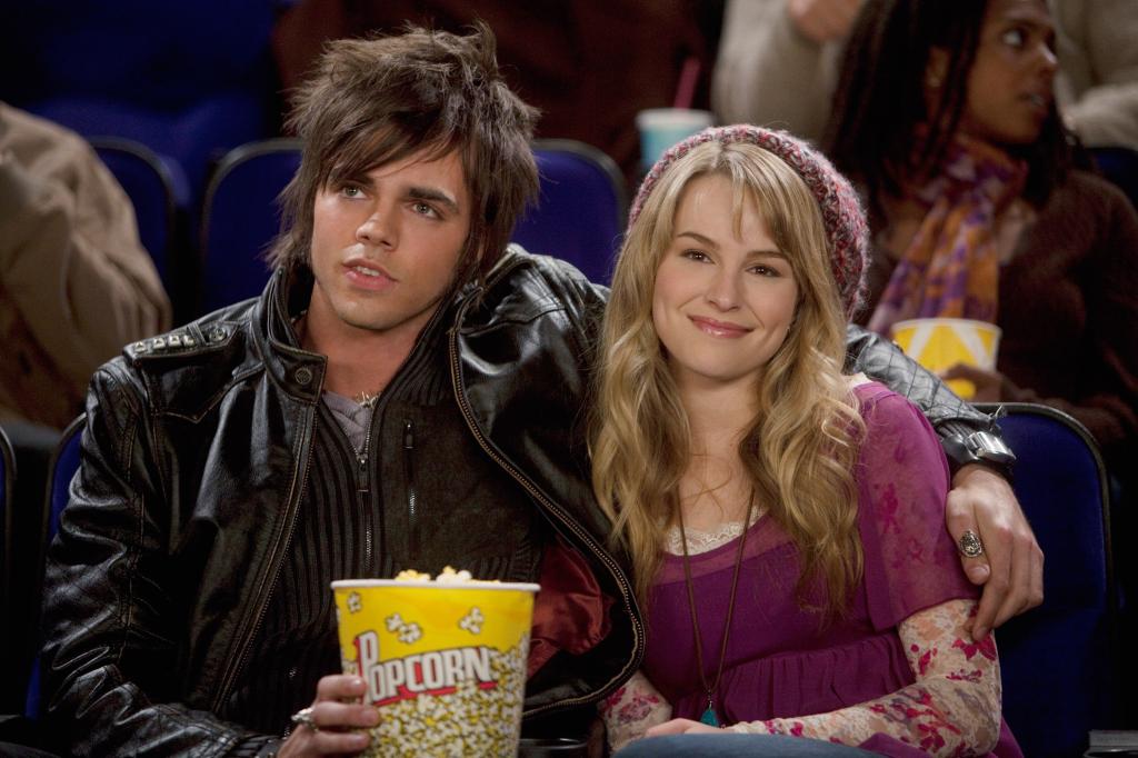 Reid Ewing and Bridgit Mendler filming "Good Luck Charlie" in 2010.