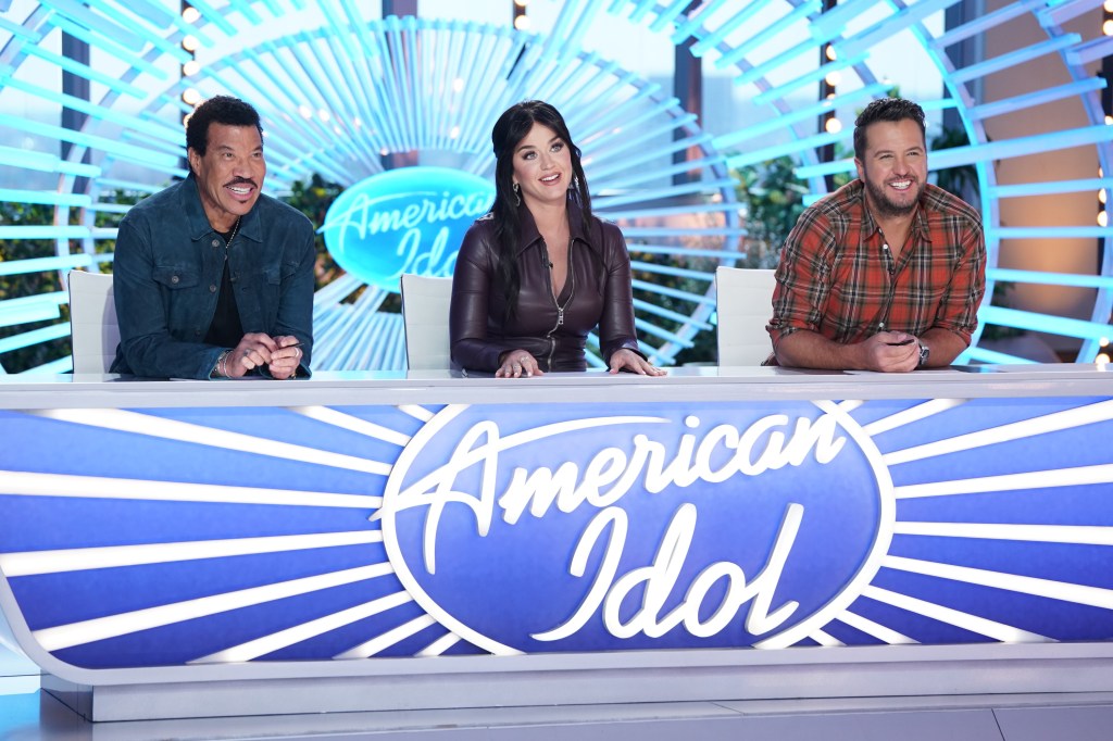 lionel richie, katy perry and luke bryan sitting at "american idol" judges' table