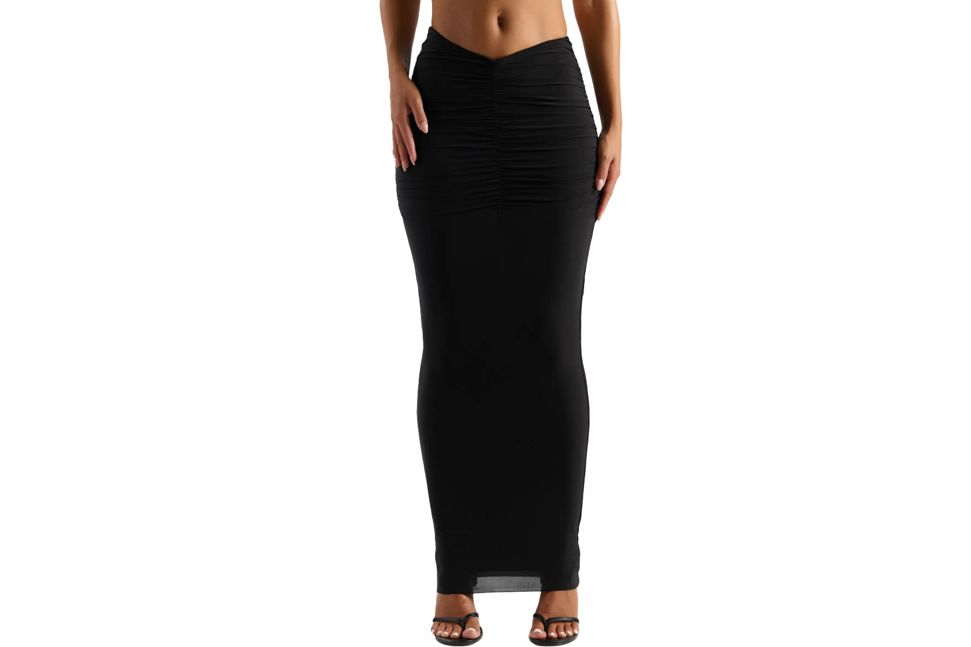 A model in a black maxi skirt