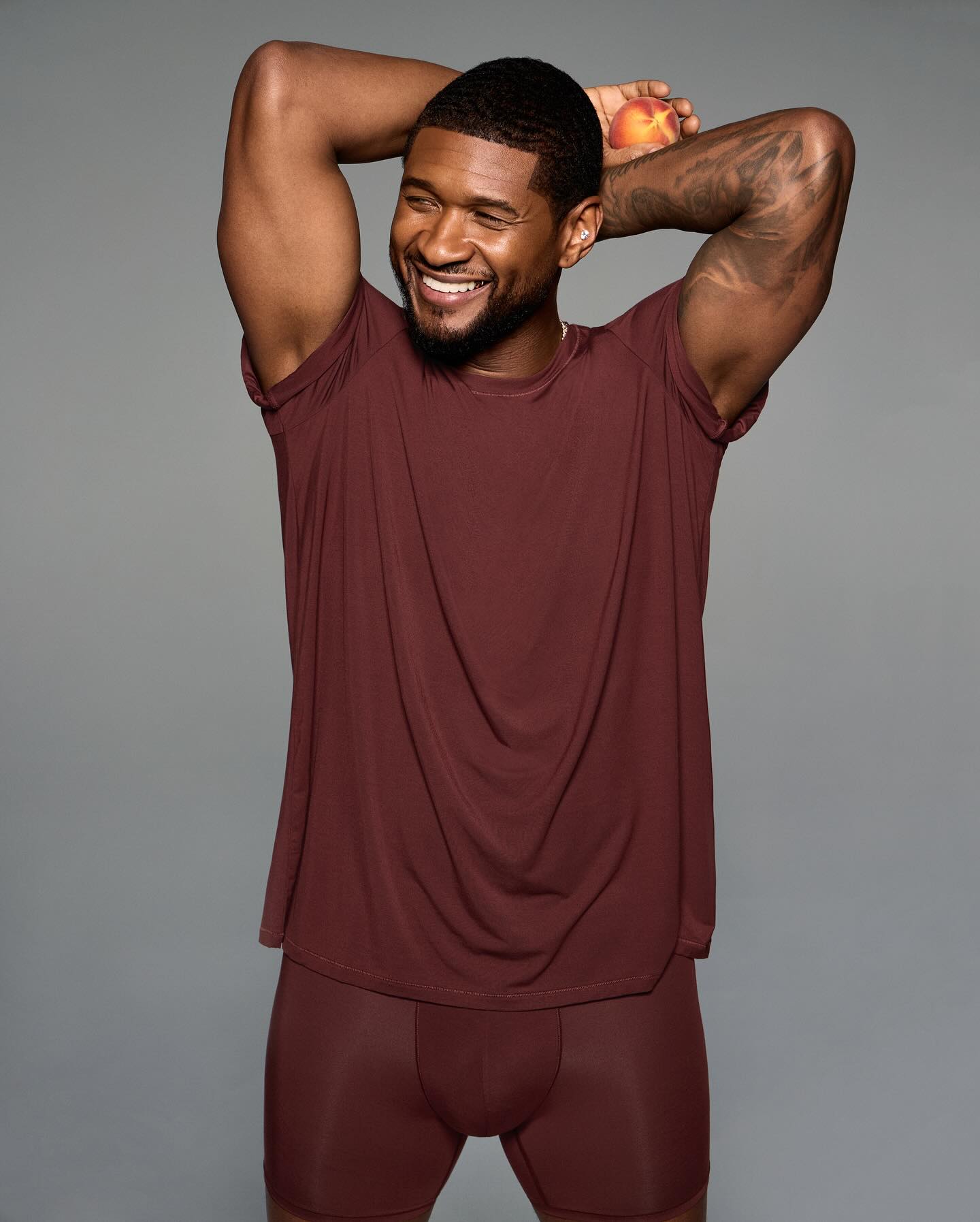 Usher in a T-shirt and underwear