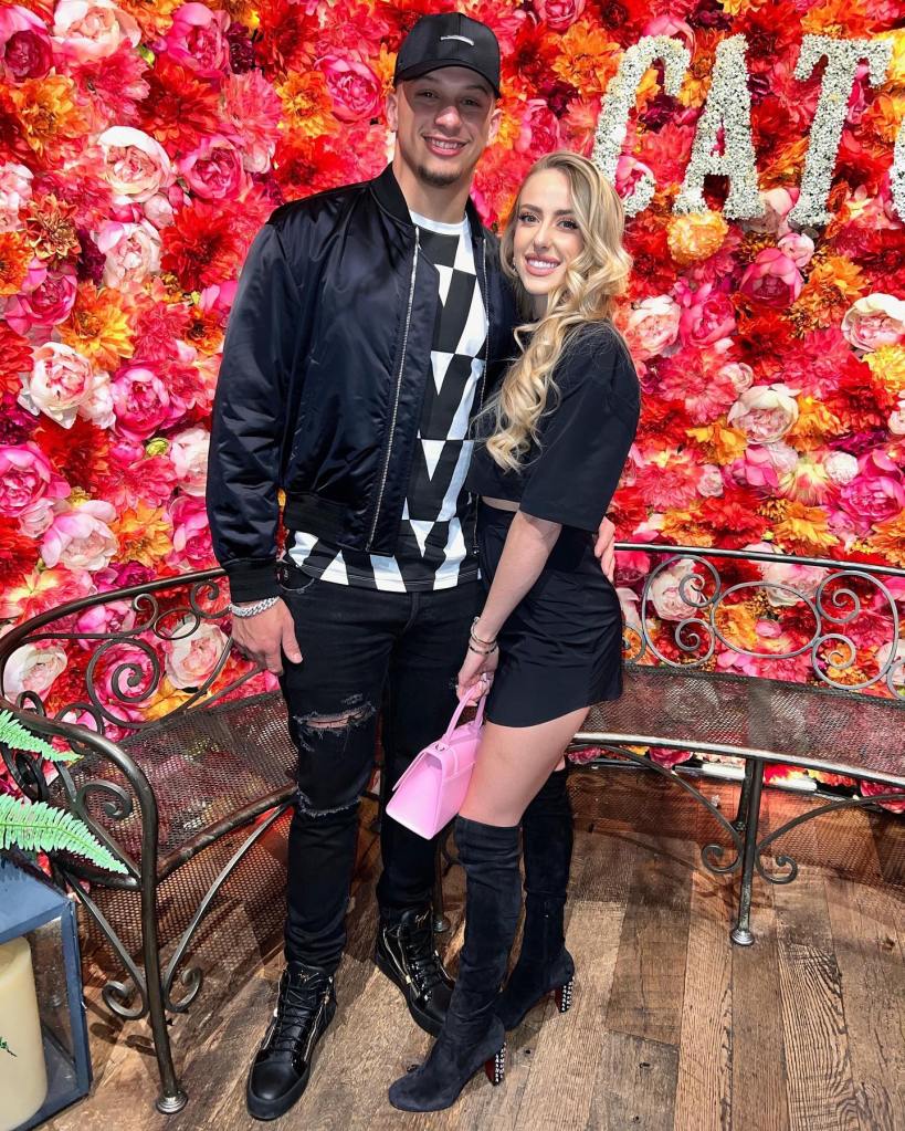 Brittany Mahomes and Patrick Mahomes smiling together