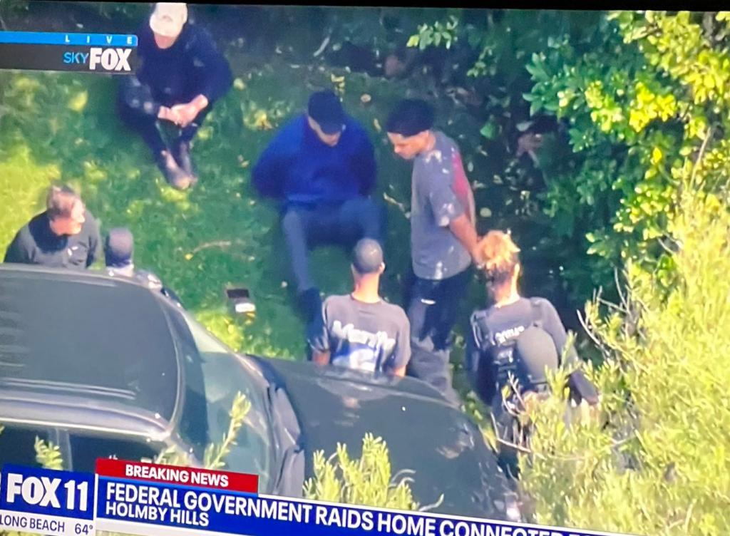 King Combs and Justin Combs being detained.