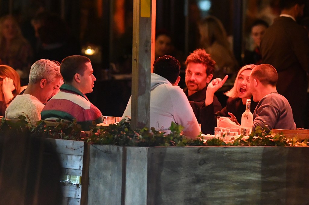 Gigi Hadid and Bradley Cooper at Via Carota. 