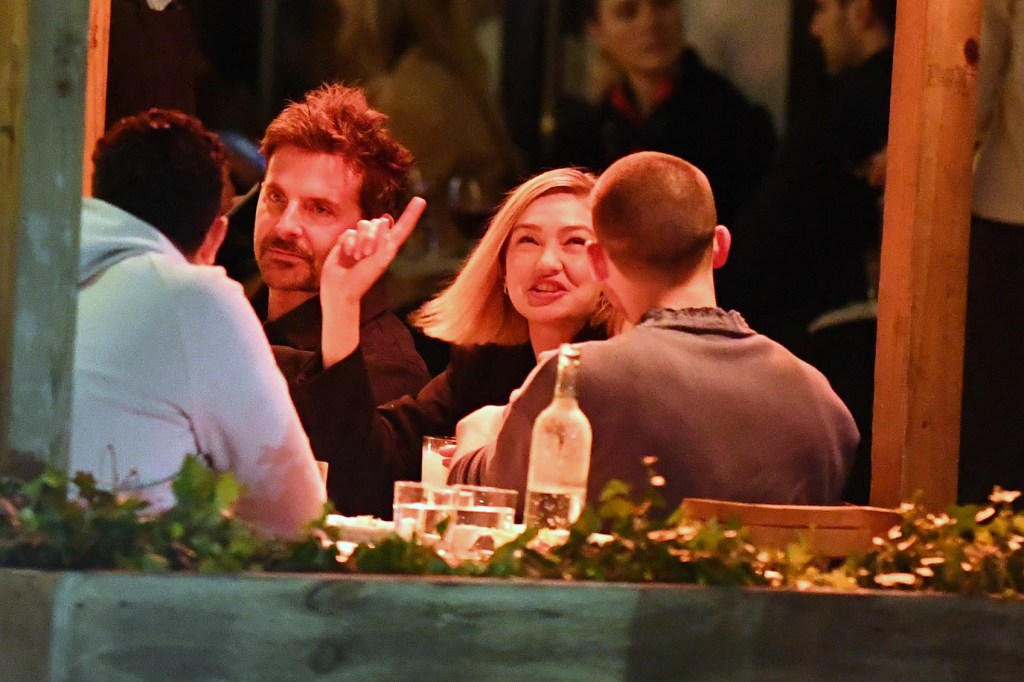 Gigi Hadid and Bradley Cooper at Via Carota. 