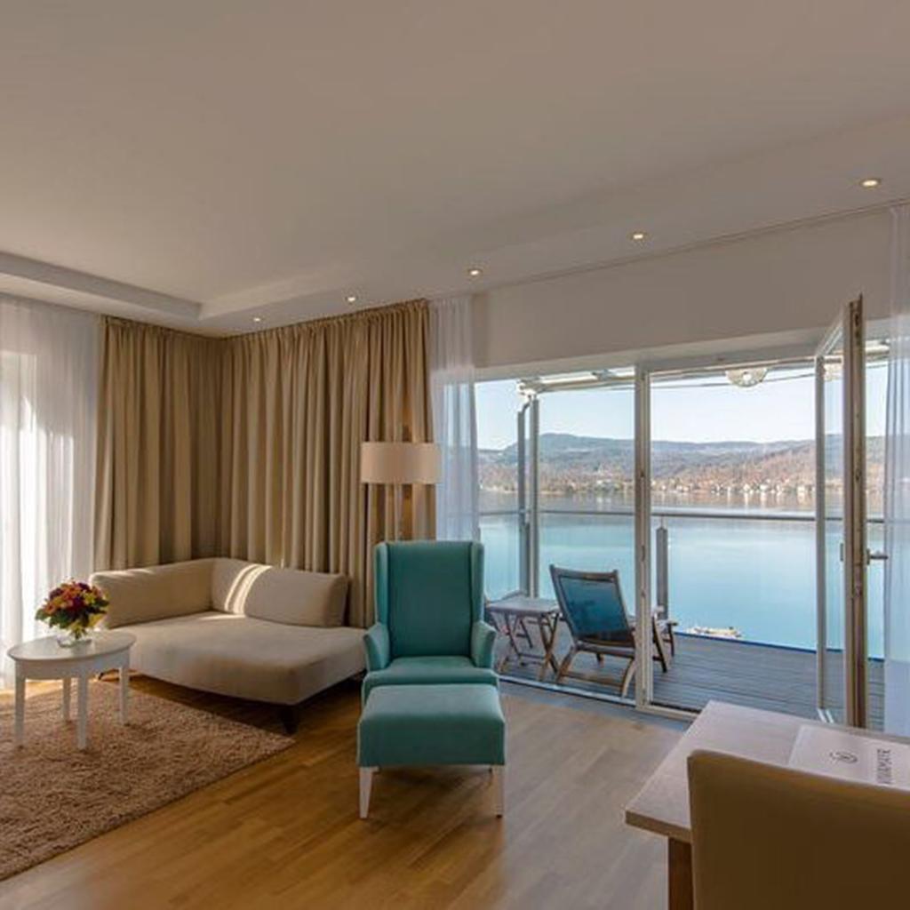 interior of hotel room with lake view