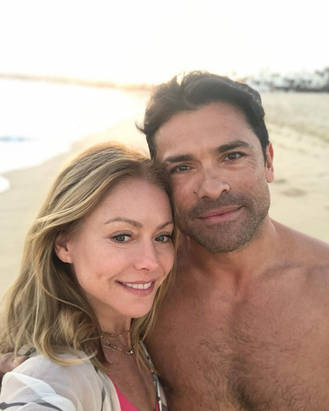 A selfie of Kelly Ripa and Mark Consuelos on the beach