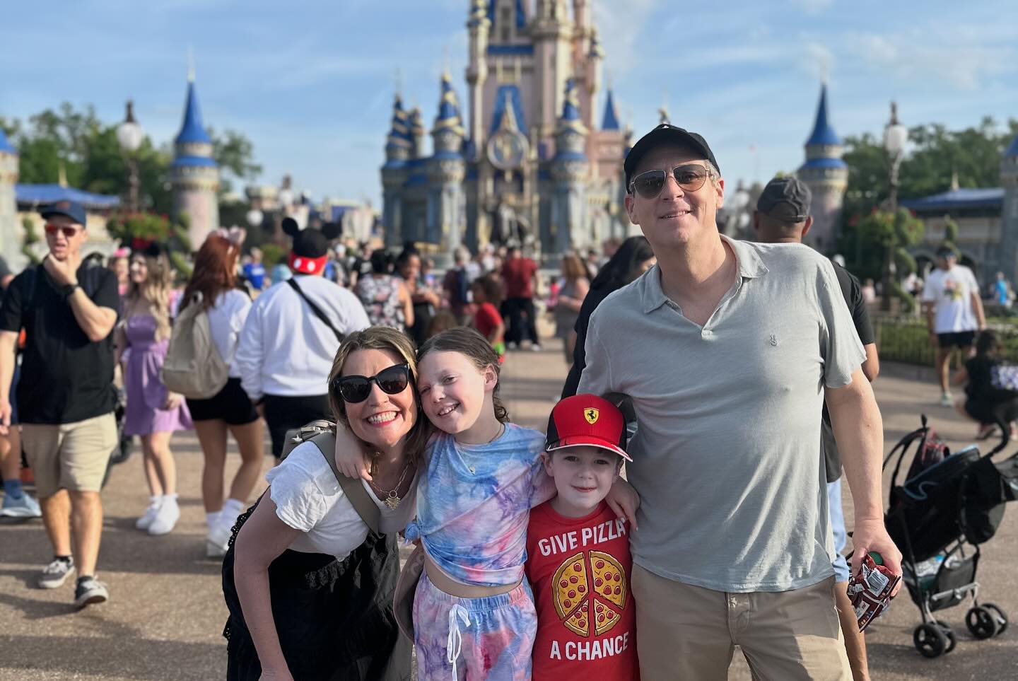 Savannah Guthrie and Michael Feldman posing with their kids