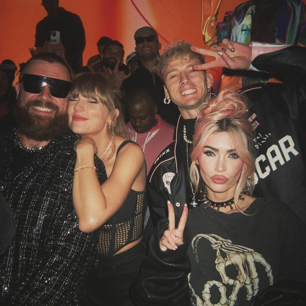 taylor swift leaning on travis kelce's shoulder next to megan fox and machine gun kelly