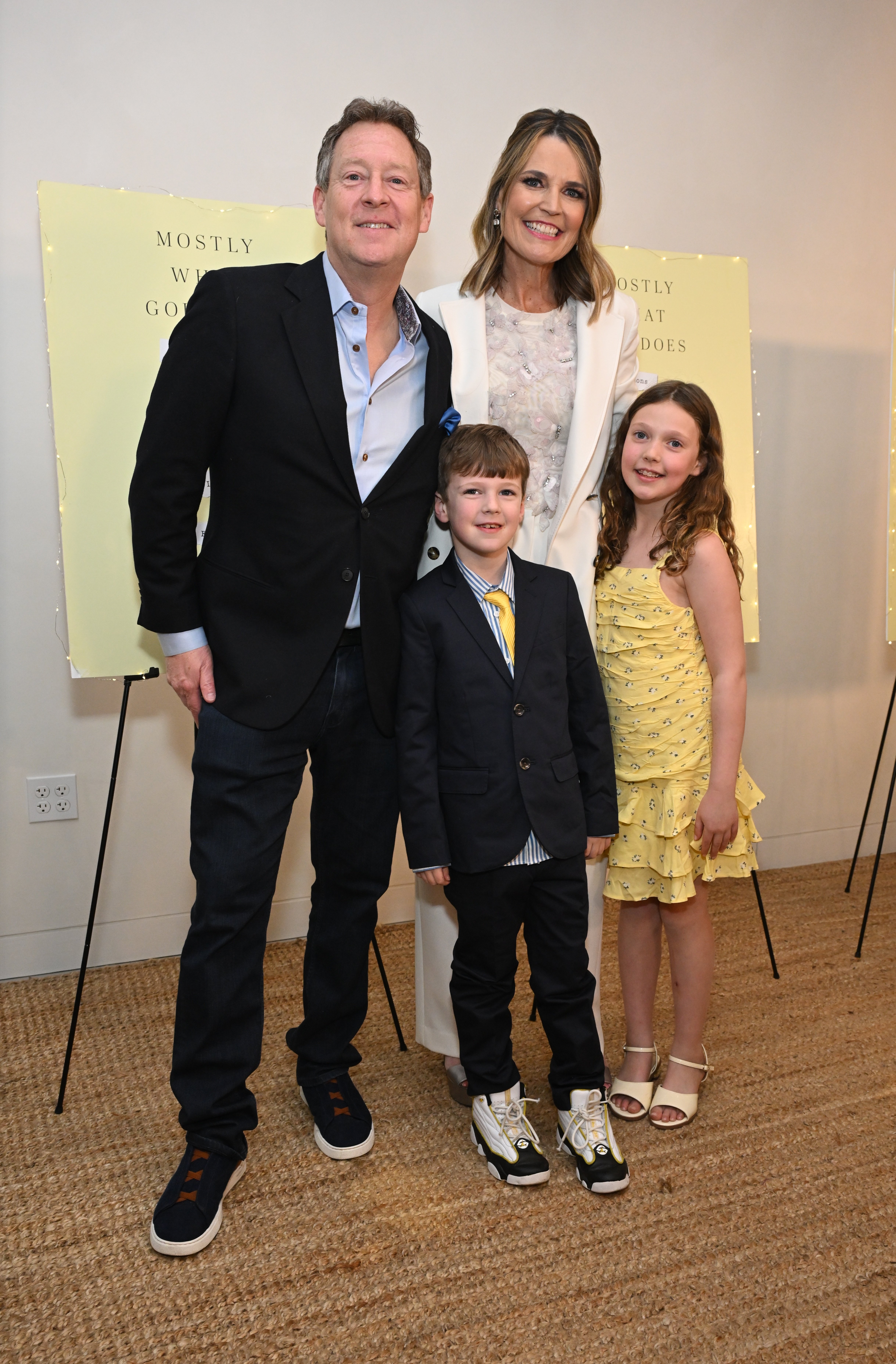 Savannah Guthrie posing with Mike Feldman and their kids