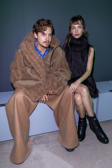 Cole Sprouse and Ari Fournier attend the Sacai show during Paris Fashion Week on March 4, 2024.