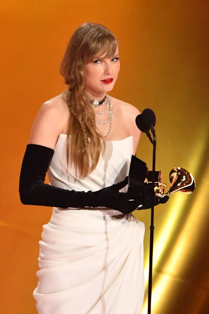 Taylor Swift accepts the Best Pop Vocal Album award at the 2024 Grammys