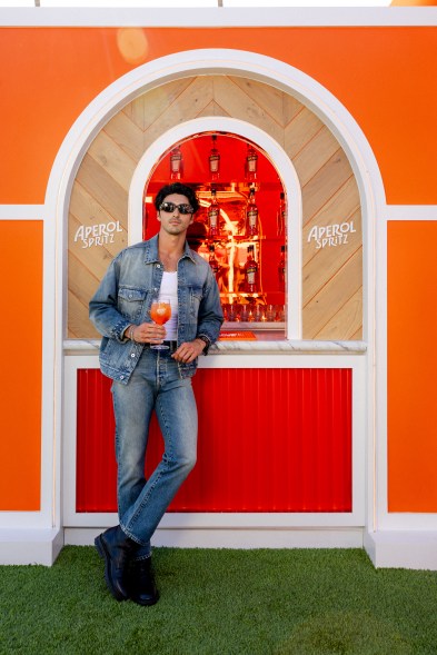 Actor, Taylor Zahkar Perez, enjoys an Aperol Spritz at the new Aperol Terrazza during Coachella’s opening weekend. Guests to the Terrazza were given an Aperitivo Italiano experience that included a sit-down tasting paired an Aperol Spritz.