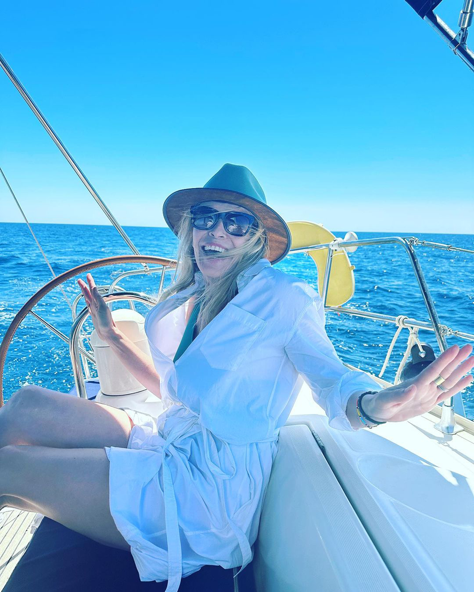 Chelsea Handler sitting on a boat