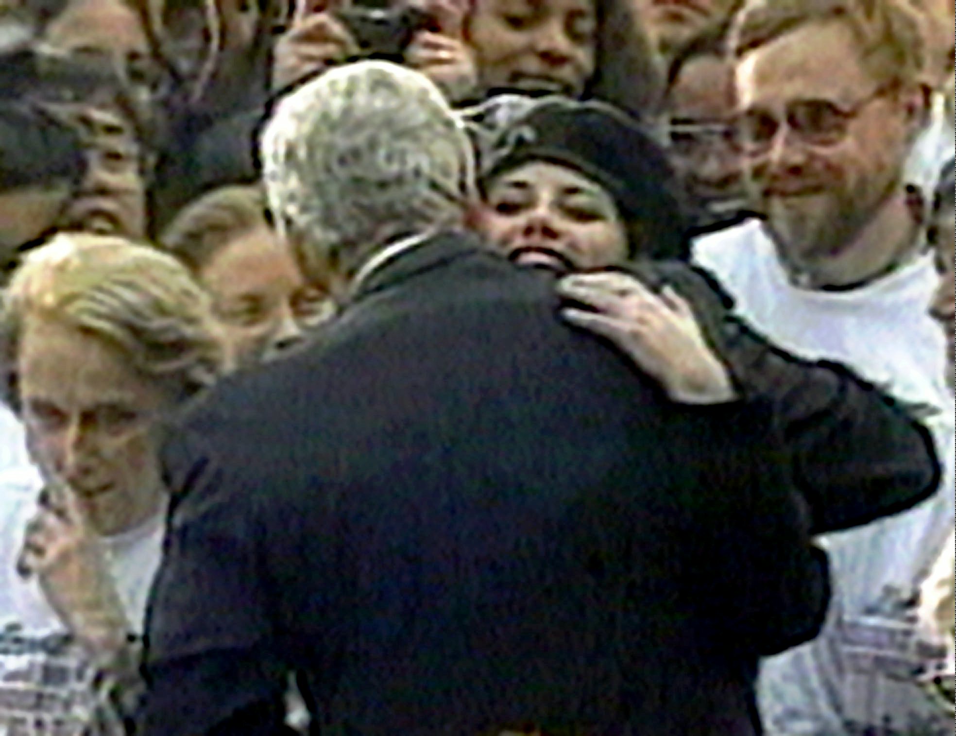 Monica Lewinsky embraces President Clinton