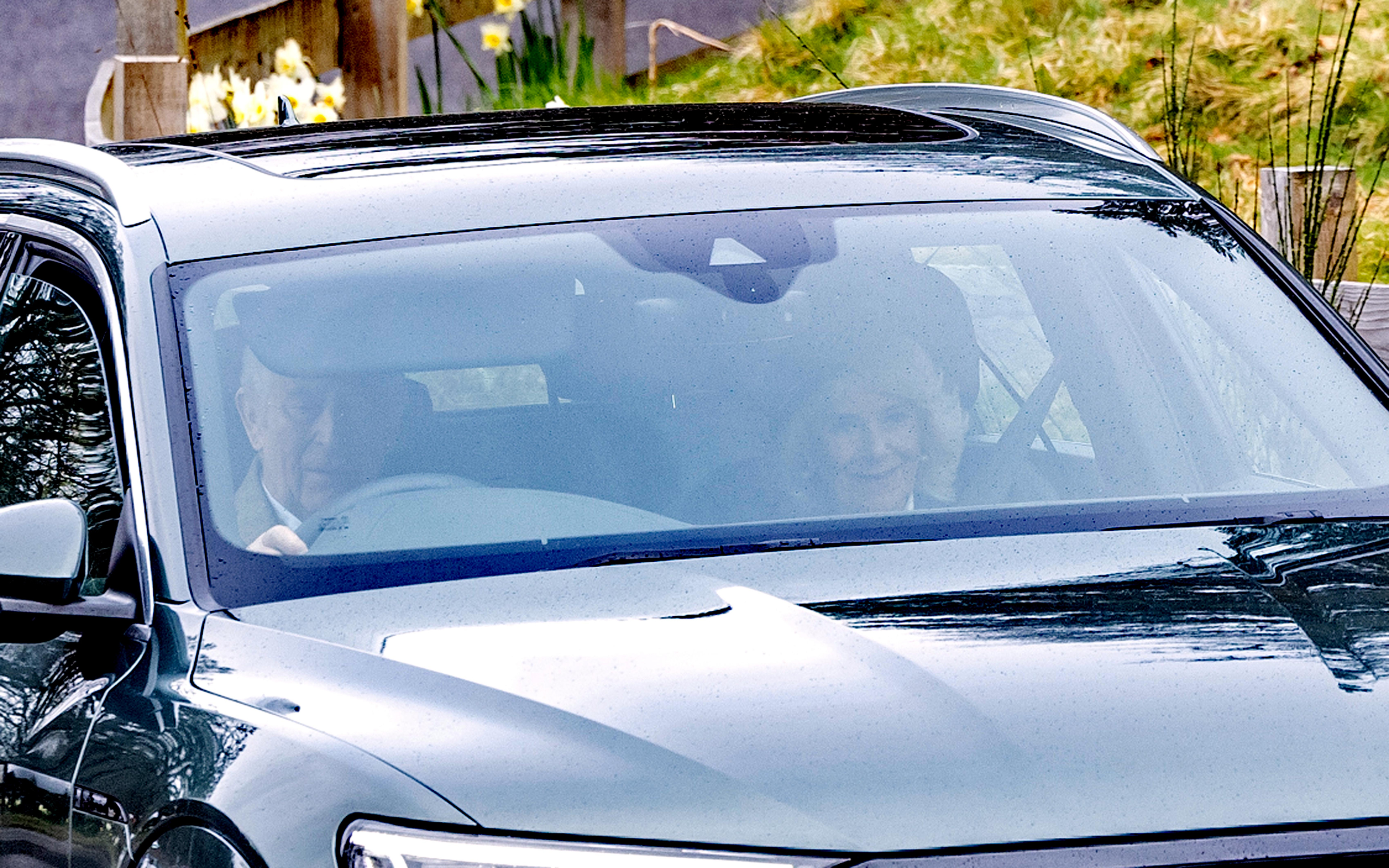 King Charles III and Queen Camilla arrive at Crathie Kirk.