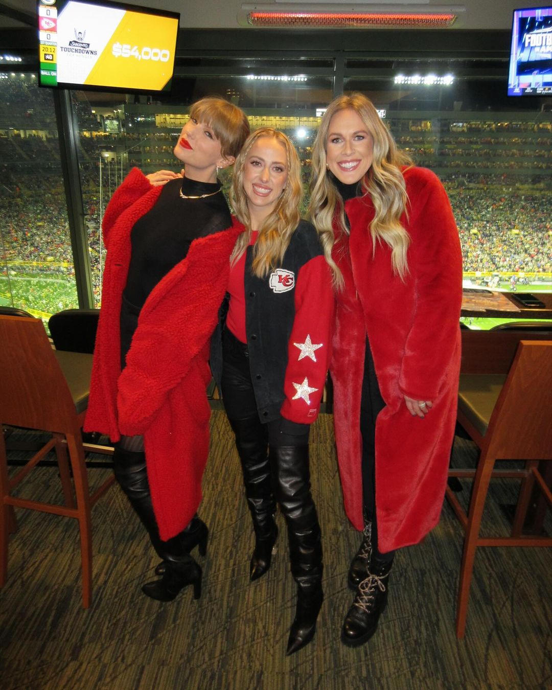 Brittany Mahomes, Taylor Swift and another WAG at a game.