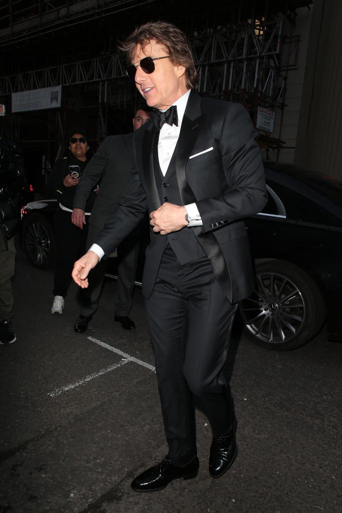 Tom Cruise arriving at Victoria Beckham's 50th birthday party 