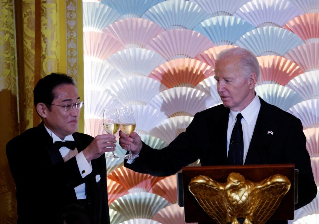 U.S. President Joe Biden and Japan's Prime Minister Fumio Kishida toast.