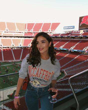 Olivia Culpo at a football game. 