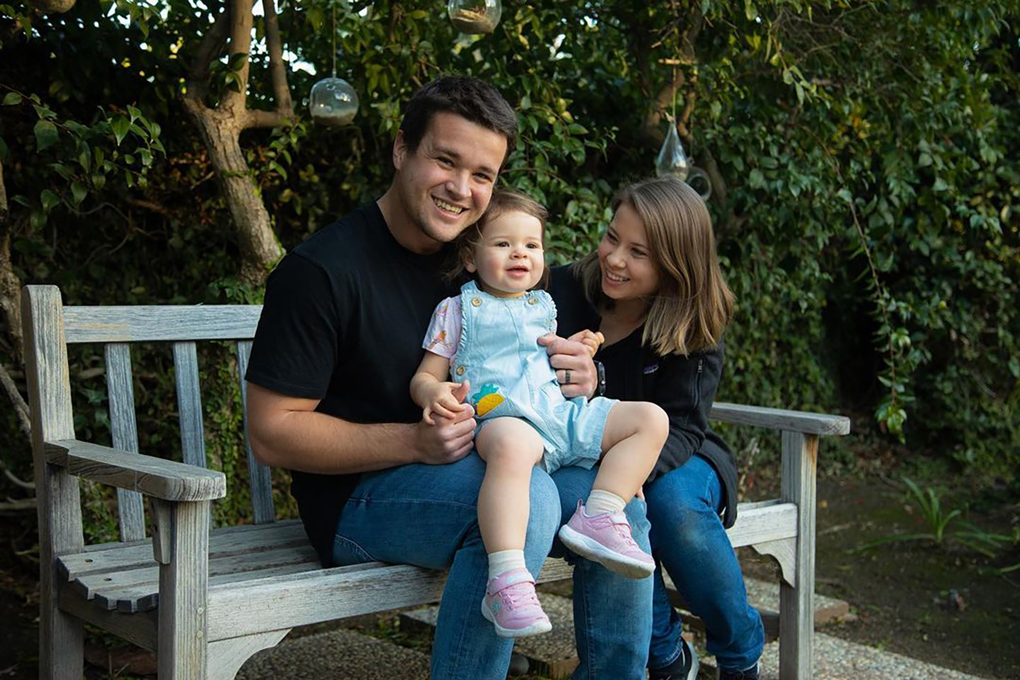 Bindi Irwin and her husband Chandler Powell and their daughter Grace.