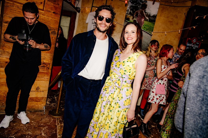 Dylan O'Brien and Sarah Ramos at a party