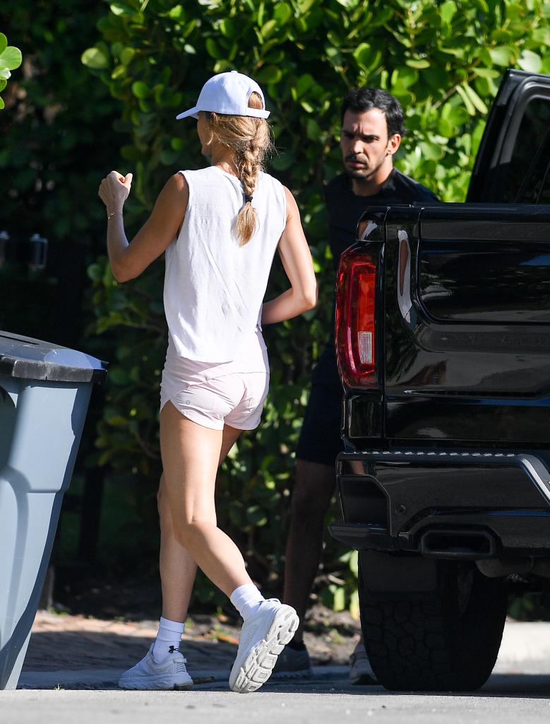 Gisele Bündchen hanging out with Joaquim Valente.