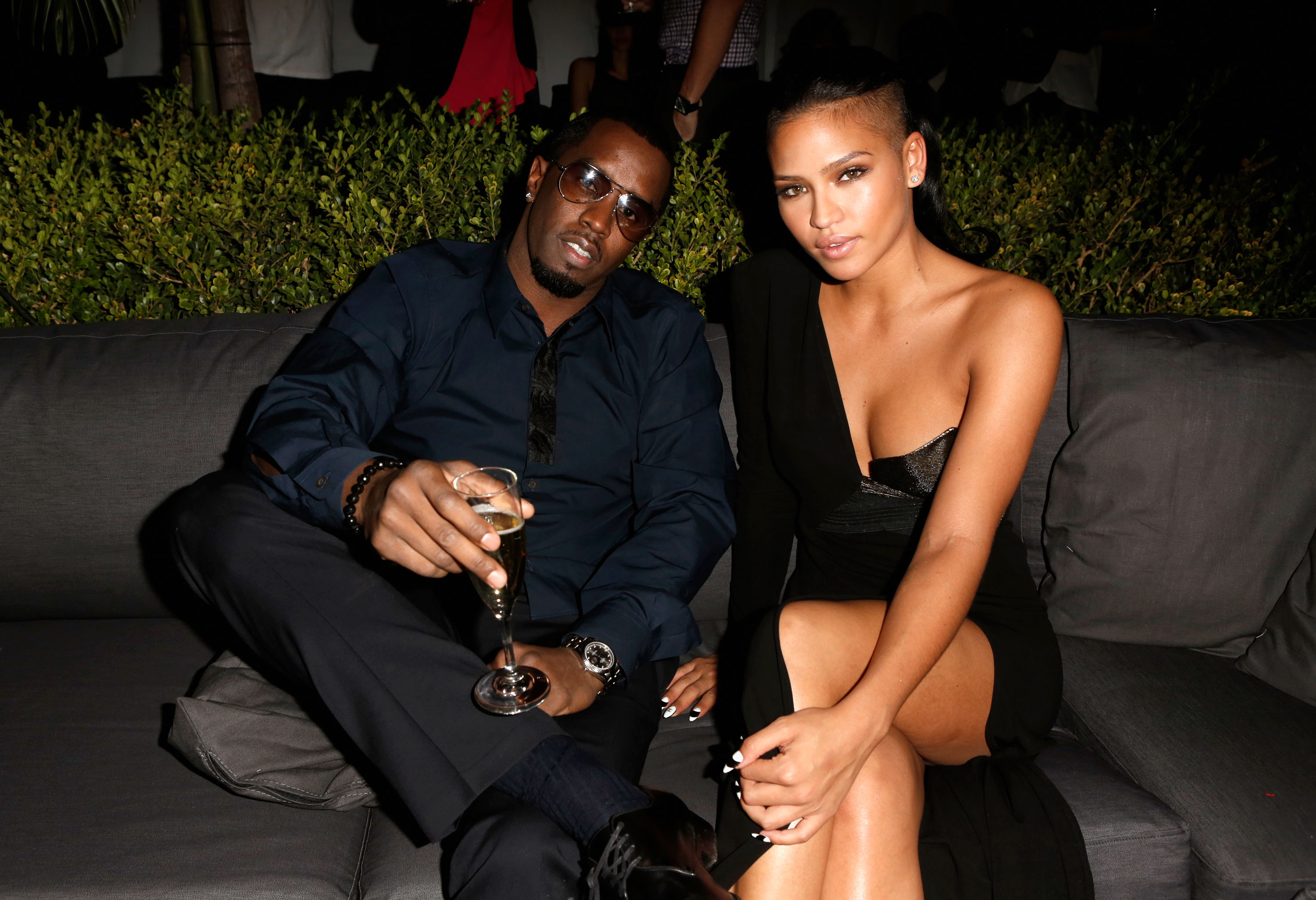 Sean "Diddy" Combs and Cassie Ventura posing together 