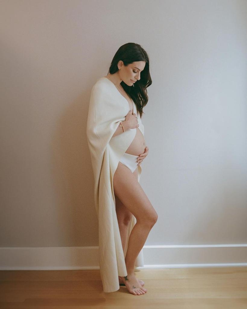 Lea Michele reveals she's pregnant, shows off baby bump.