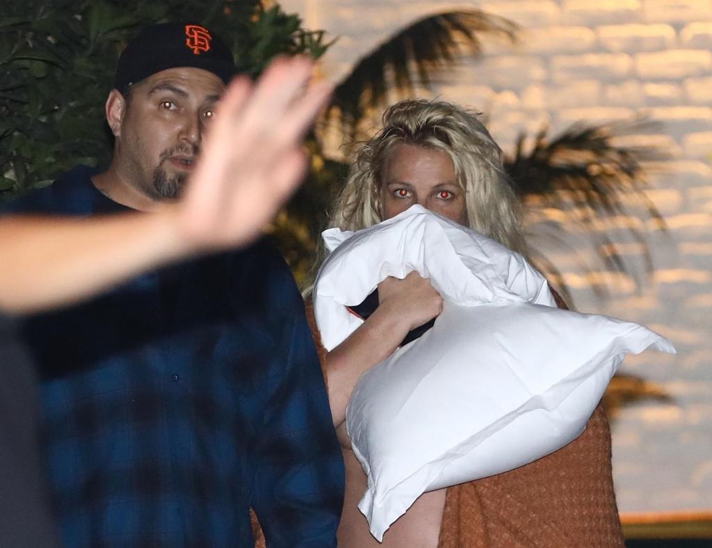 Britney Spears holding a pillow.