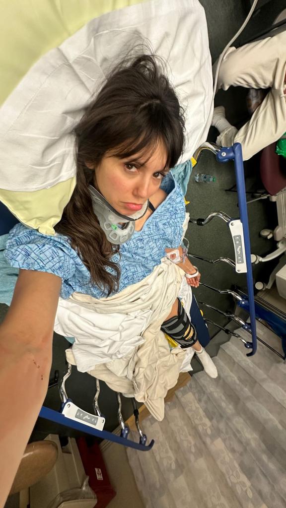 Nina Dobrev in a hospital bed