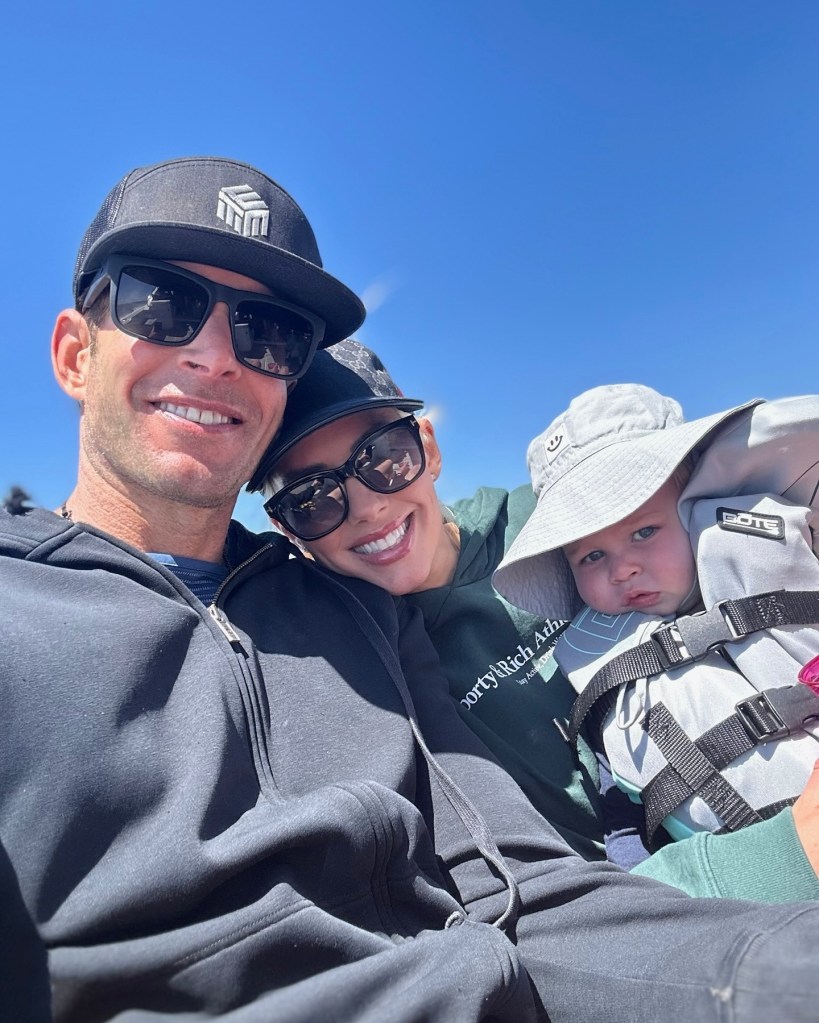 Heather Rae Young and Tarek El Moussa with their son Tristan. 