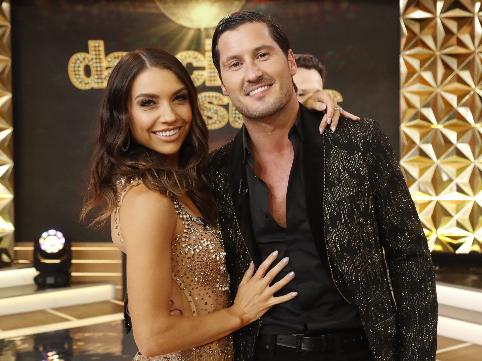 Val Chmerkovskiy and Jenna Johnson posing together 