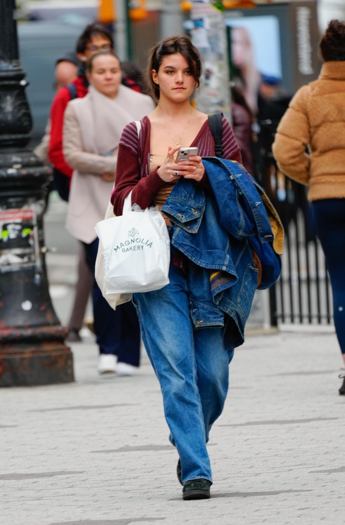 Suri Cruise walking in New York City. 