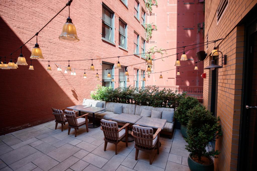 The Magic Room's outdoor terrace at The Ned Nomad. 