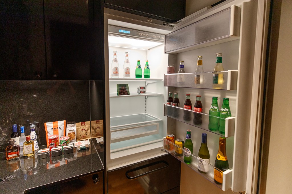 Inside the refrigerator and snacks in The Johnston Suite at The Ned Nomad.