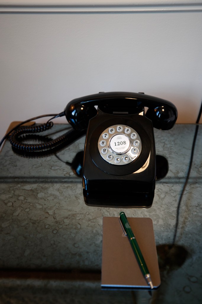 A phone at The Broadway Suite at The Ned Nomad. 